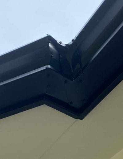 Seamless Gutters - house newly install gutter and pipe